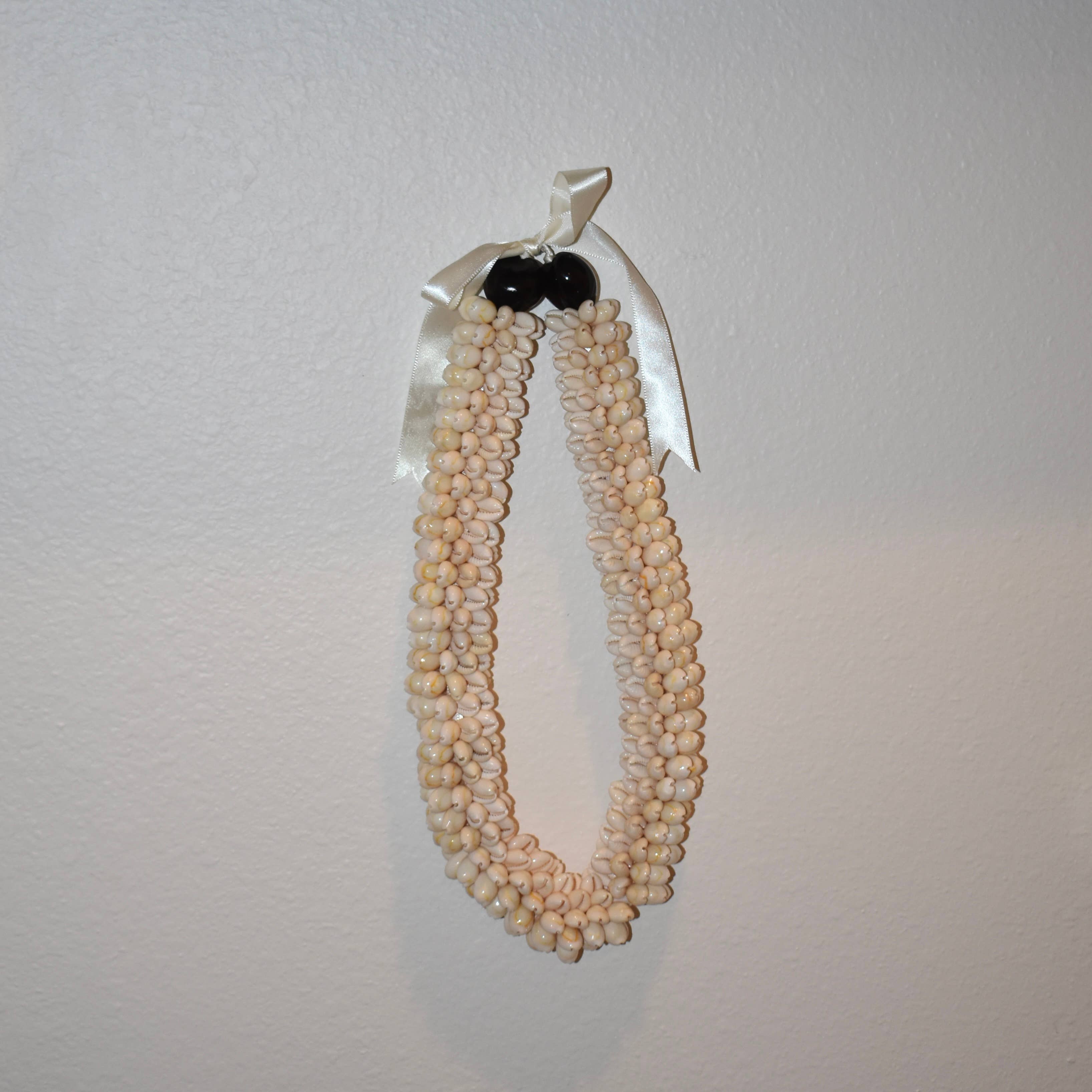 Chunky Cowrie Shell Lei: Black Kukui Nuts