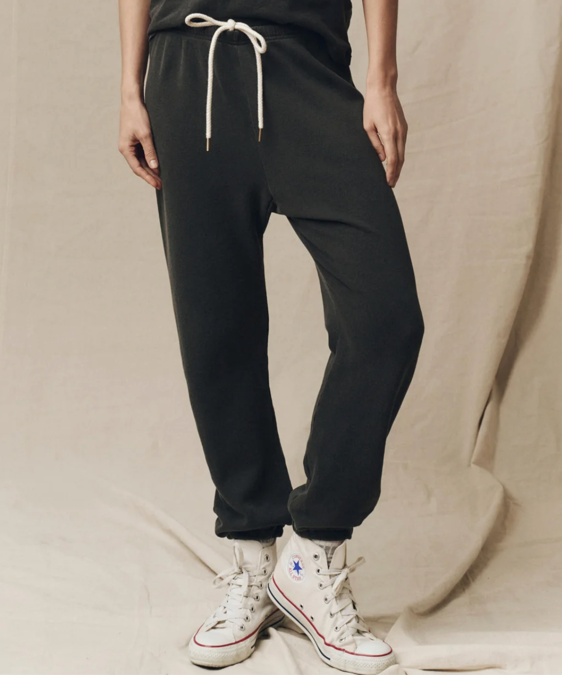 The Great. The Stadium Sweatpant in Washed Black, front view