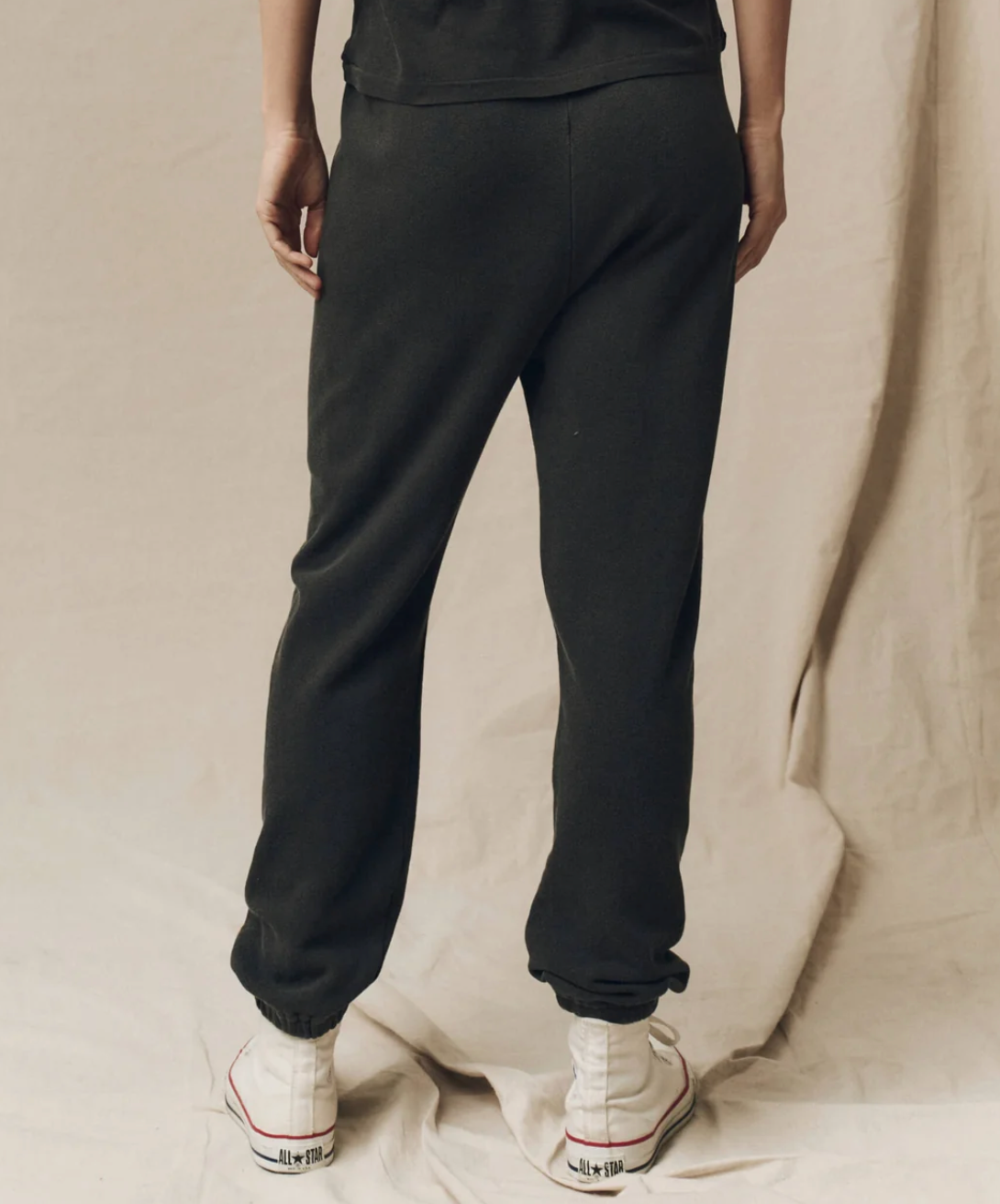 The Great. The Stadium Sweatpant in Washed Black, back view