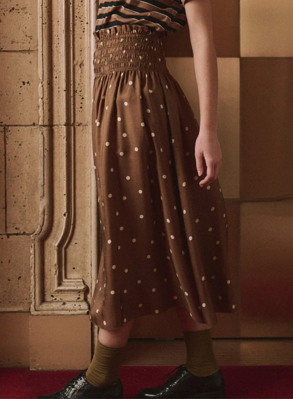 The Great. The Canary Skirt in Copper Bubble Dot, side detail