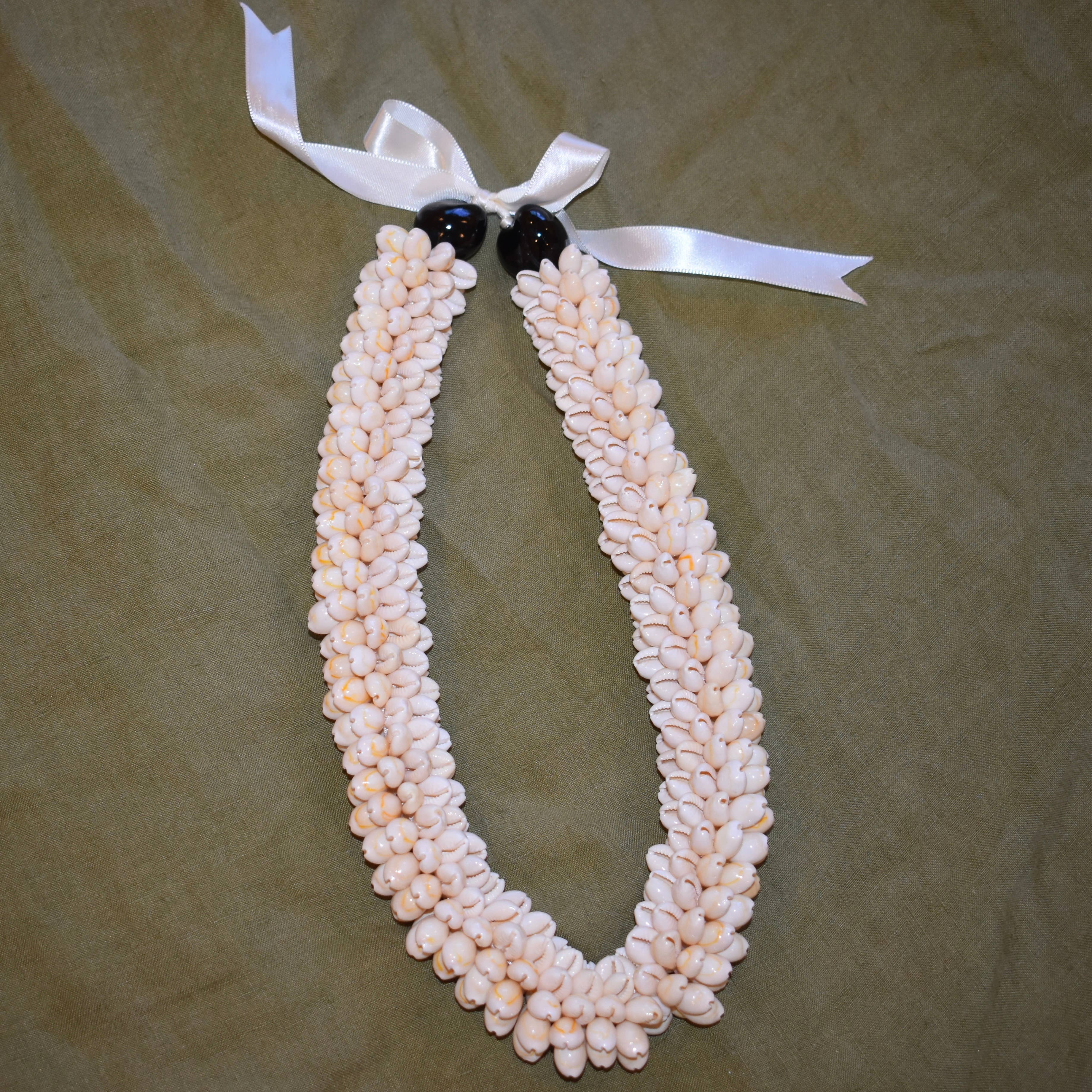 Chunky Cowrie Shell Lei: Black Kukui Nuts