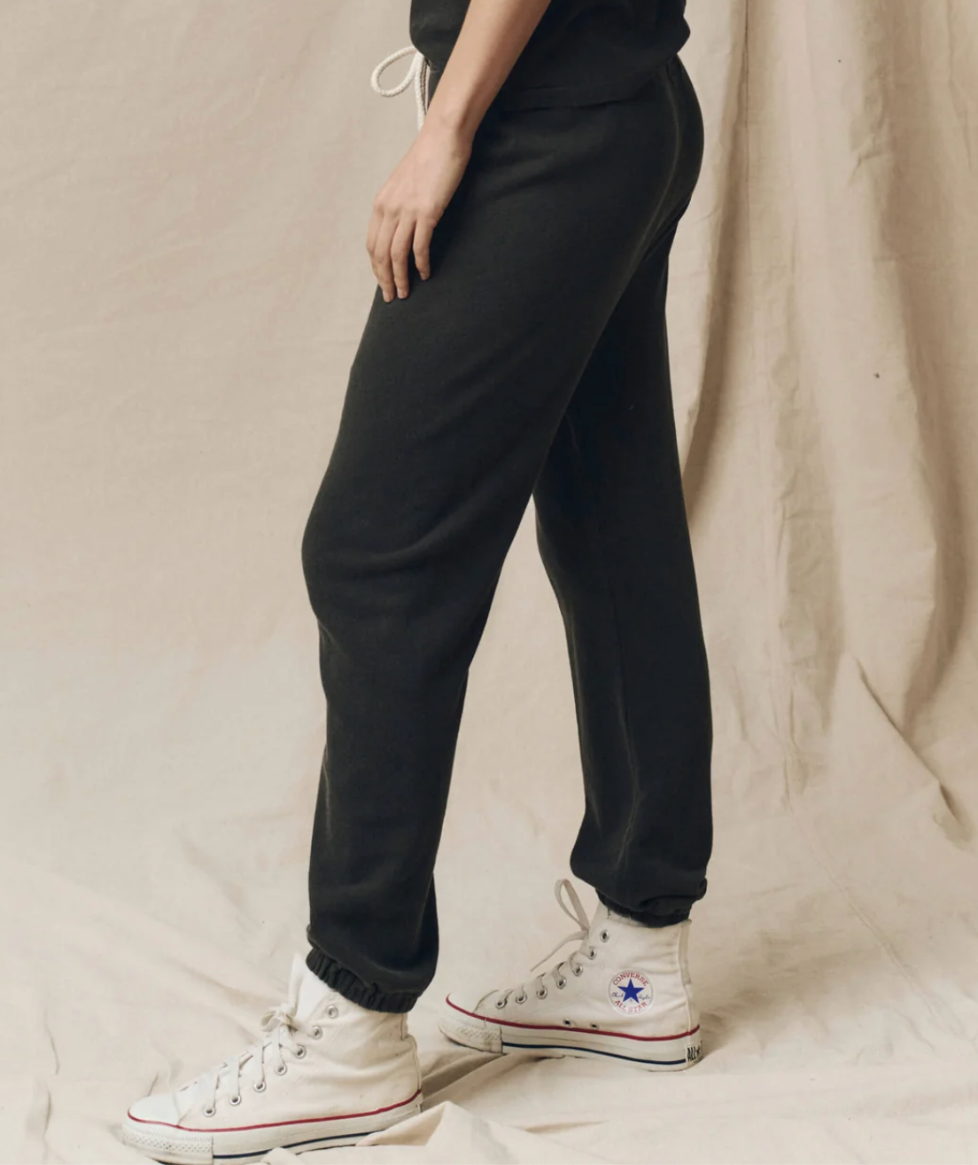 The Great. The Stadium Sweatpant in Washed Black, side detail